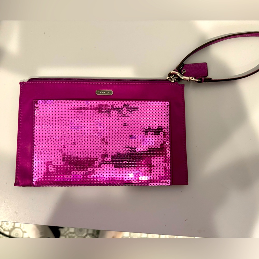 Coach Pink Sequin Wristlet. Very good conditon.